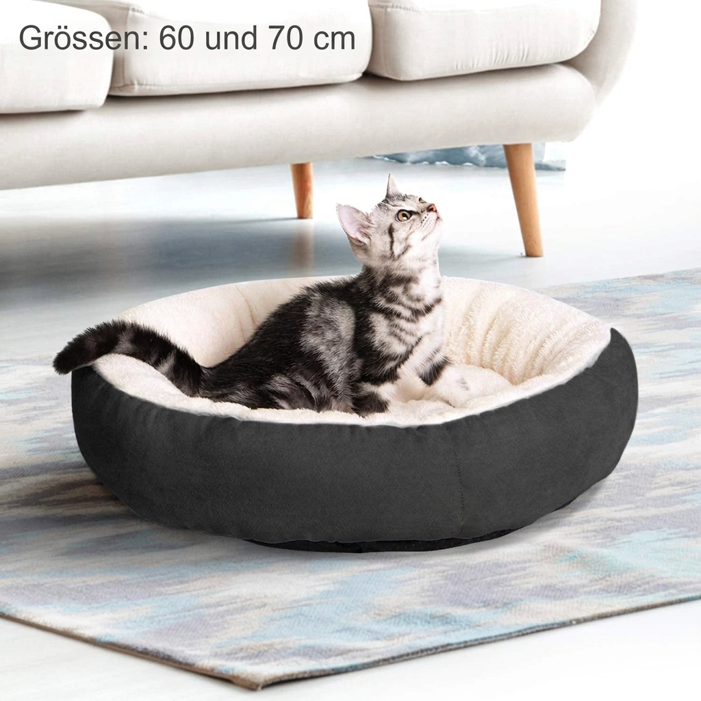 Dunkelgraues Bett mit deutscher Beschriftung