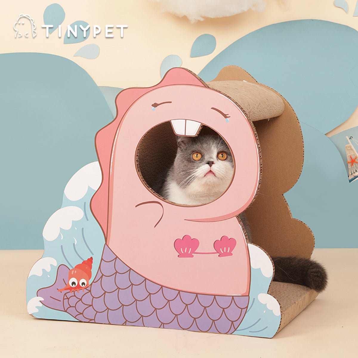 Kratzbrett für kleine rosa Katzen mit Dinosauriermotiv